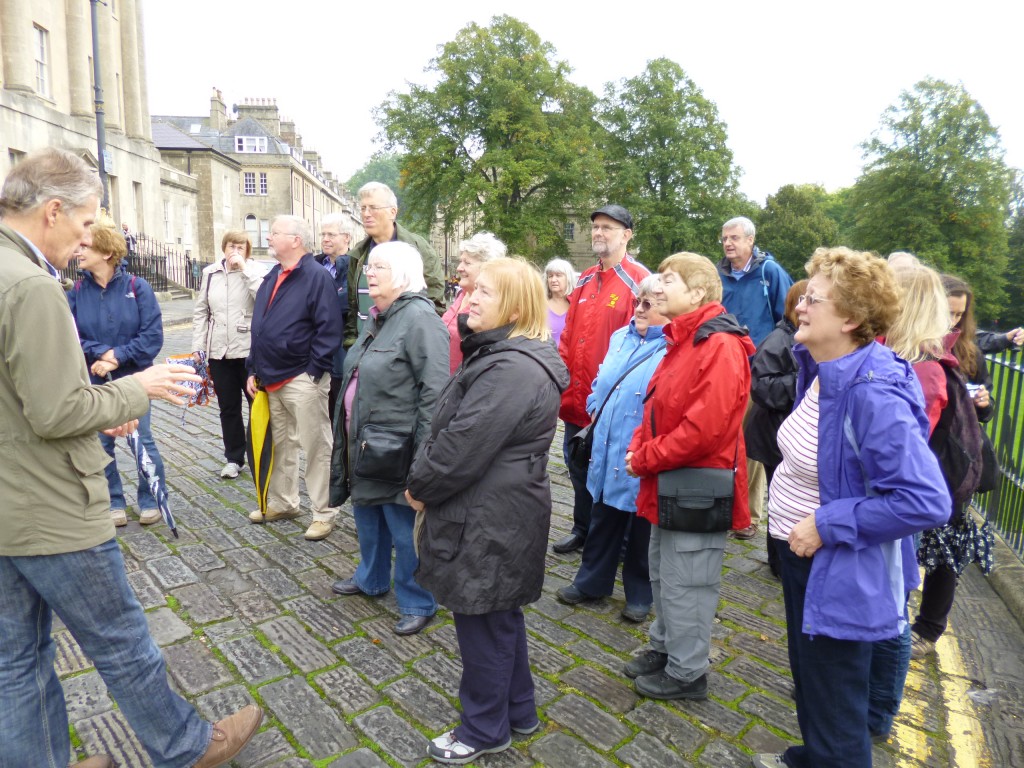 Listening to the guide looking at the Royal Crescent