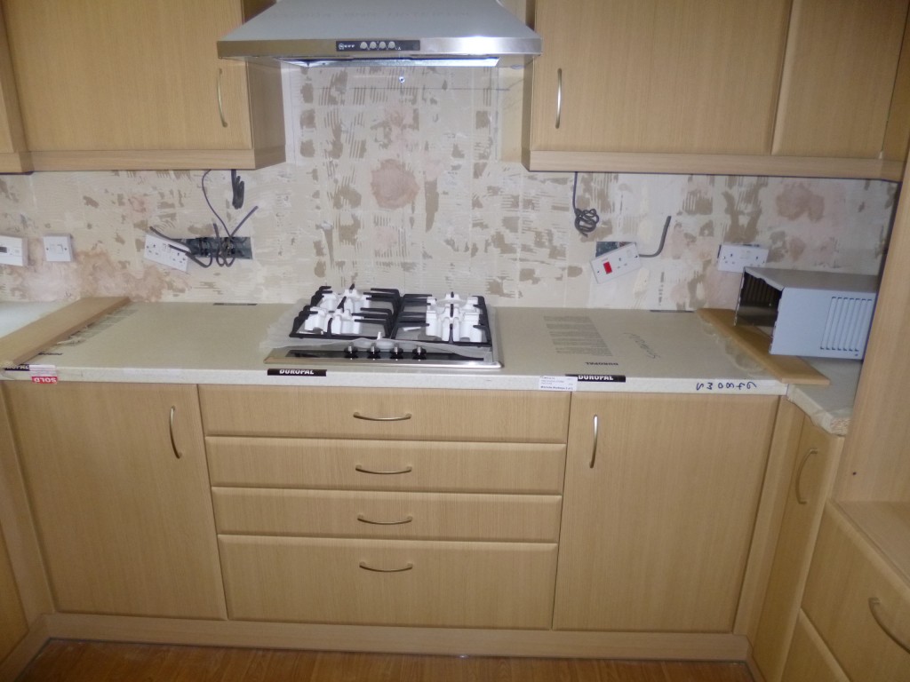 .....work tops were fitted and the hob and extractor.....